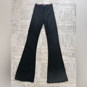 Black waxed flared jeans